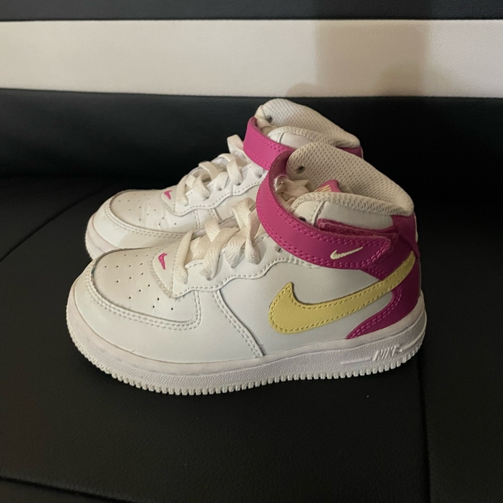 White High top Pink and yellow Jordan sneakers for toddler girls.